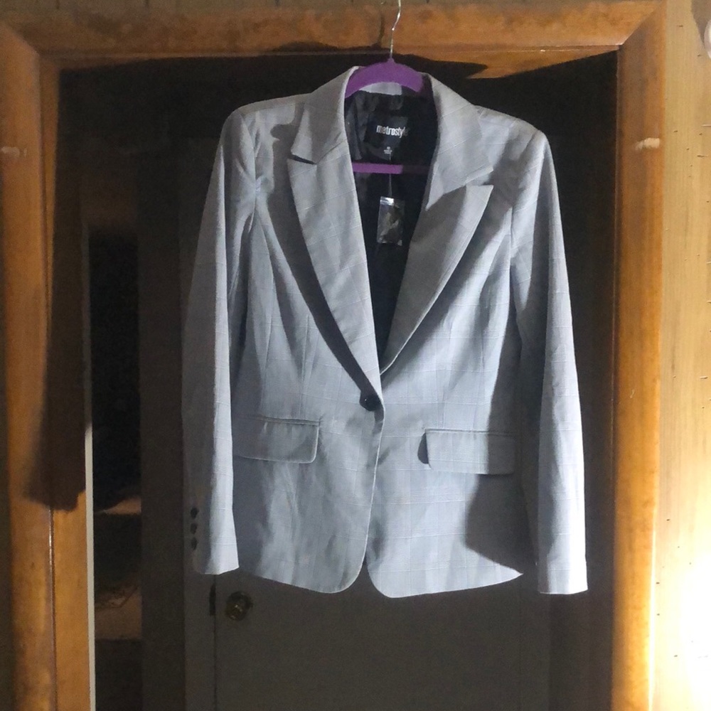 Black, grey, white with a hint of lavender dress jacket.